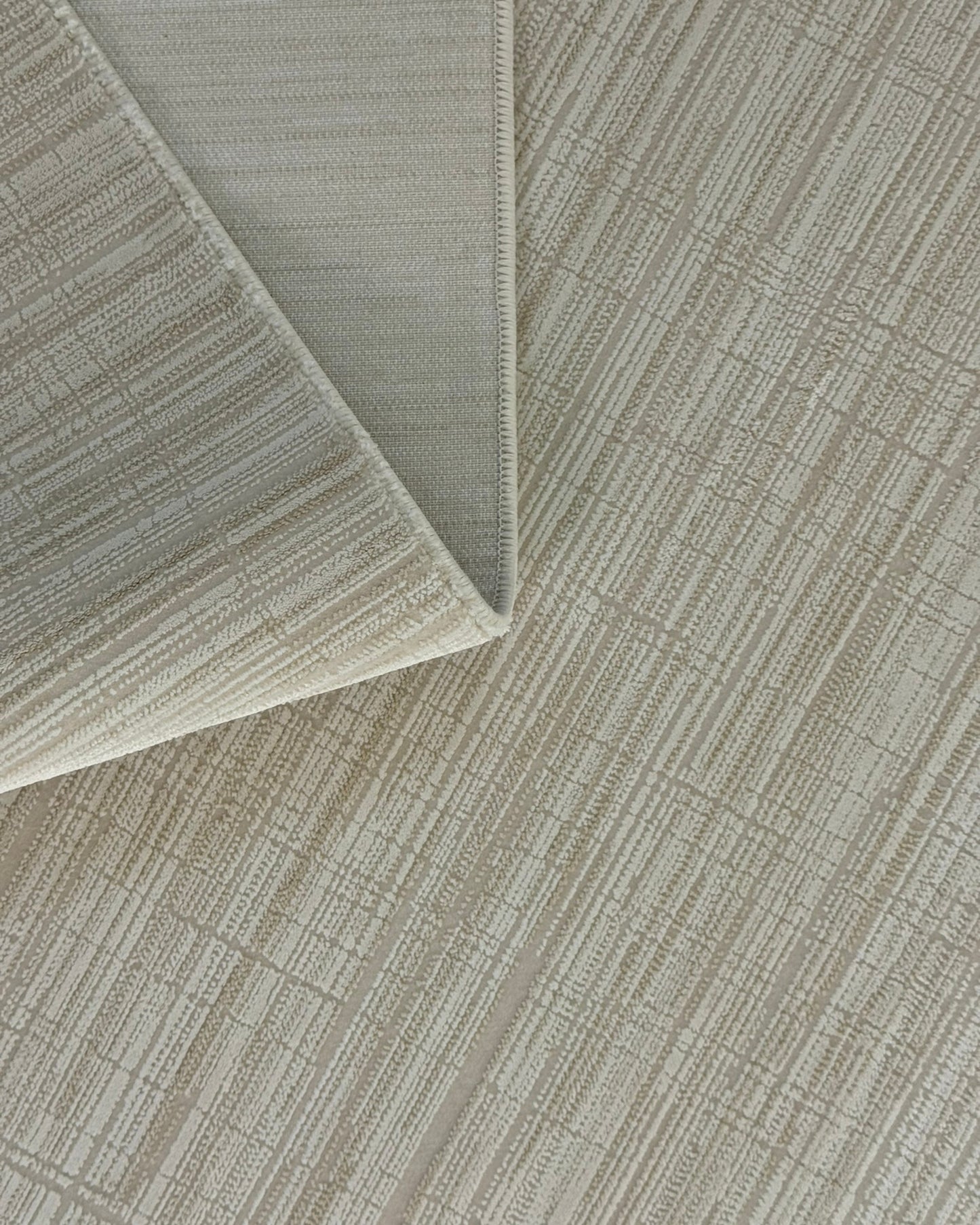 Amber Sade Desenli Makine Halısı Krem