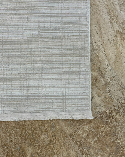 Amber Sade Desenli Makine Halısı Krem